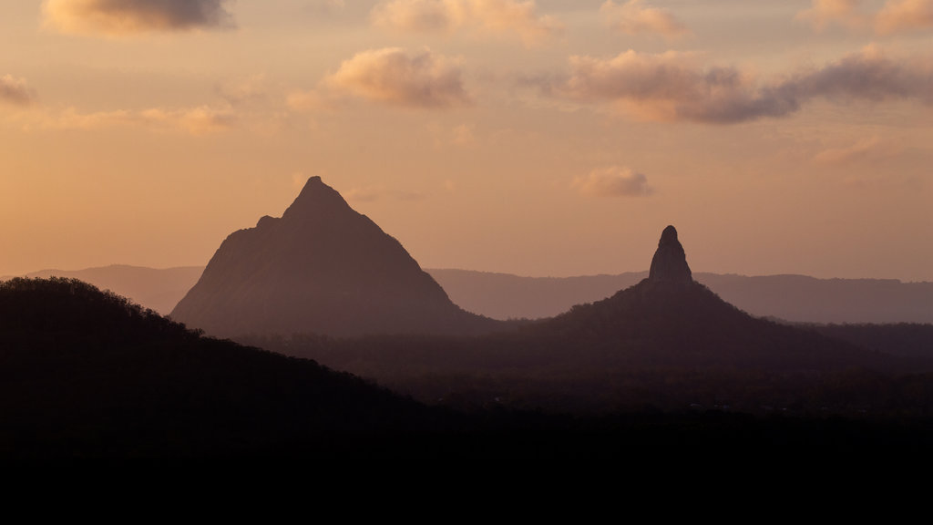 Glasshouse Mountains National Park featuring mountains, tranquil scenes and a sunset