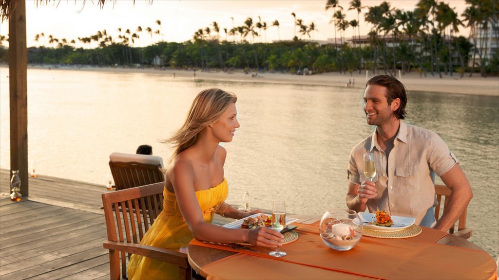 Juan Dolio showing outdoor eating and general coastal views as well as a couple