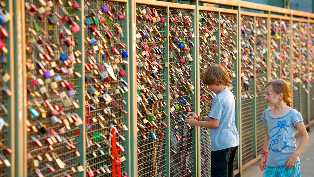 Cologne which includes a bridge as well as children