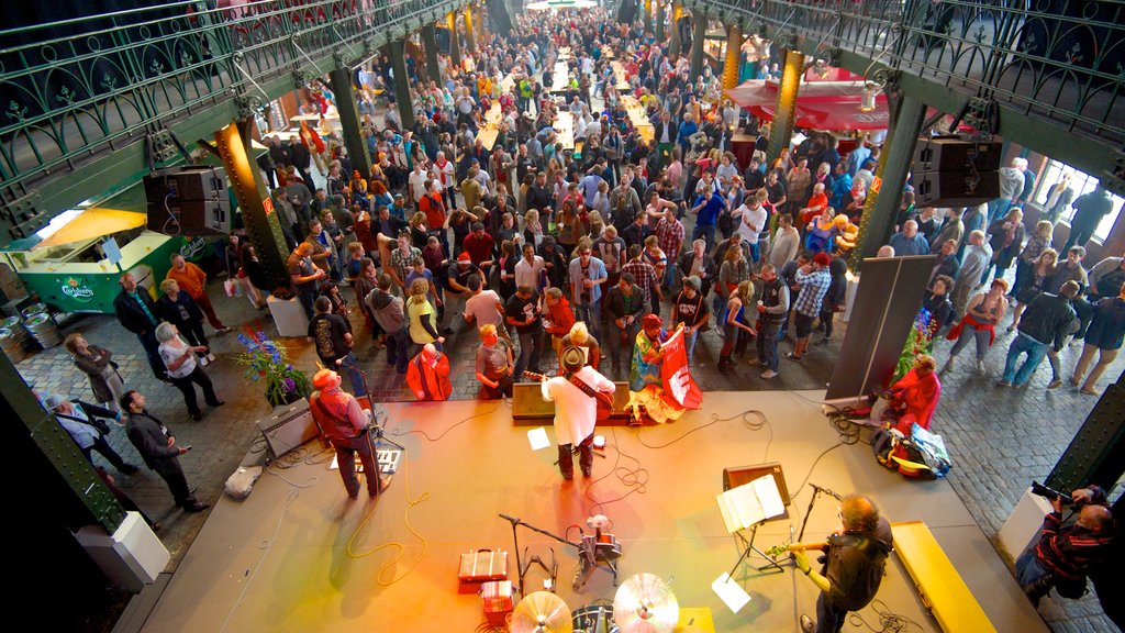 Fish Market showing markets, music and interior views