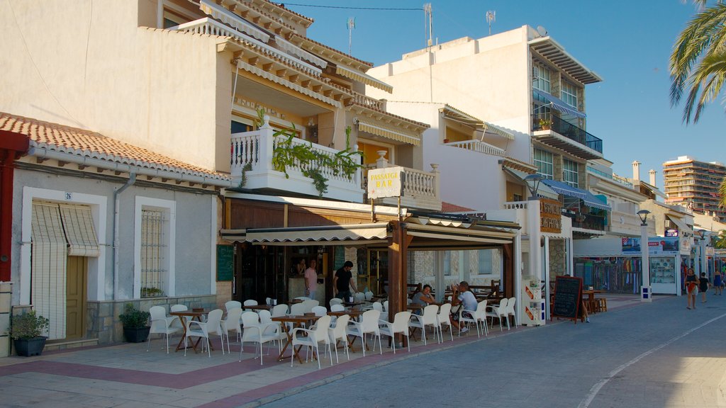 Campello Beach featuring outdoor eating, street scenes and a coastal town