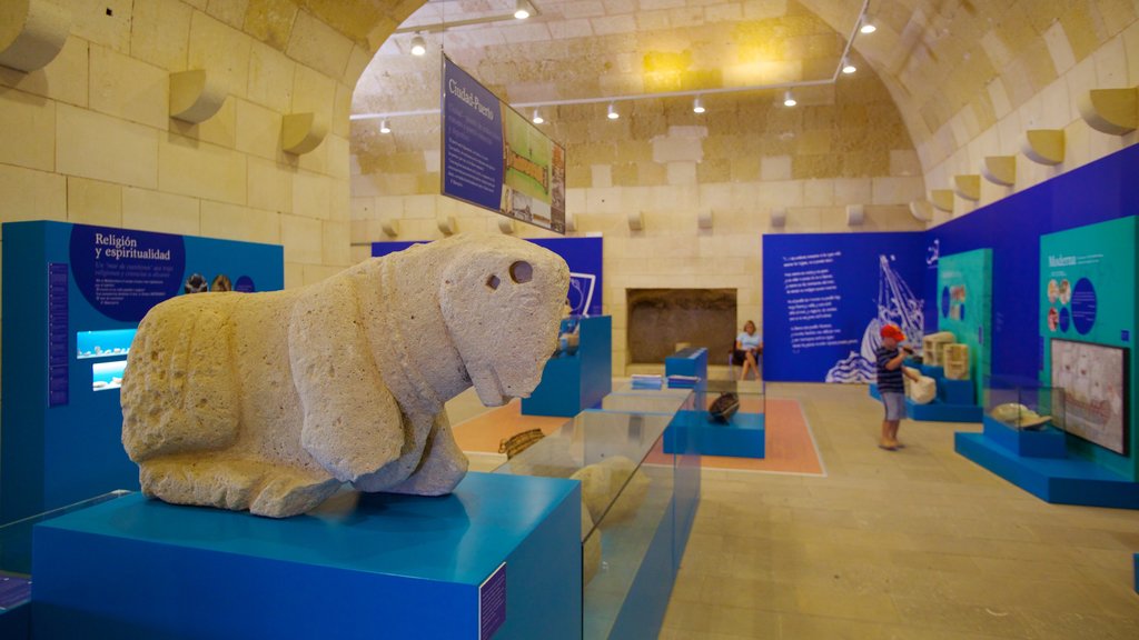 Castle of Santa Barbara featuring a castle and interior views