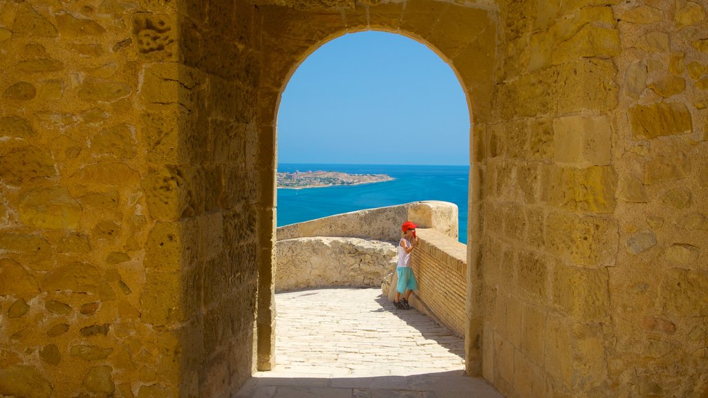 Castle of Santa Barbara which includes château or palace, heritage elements and views