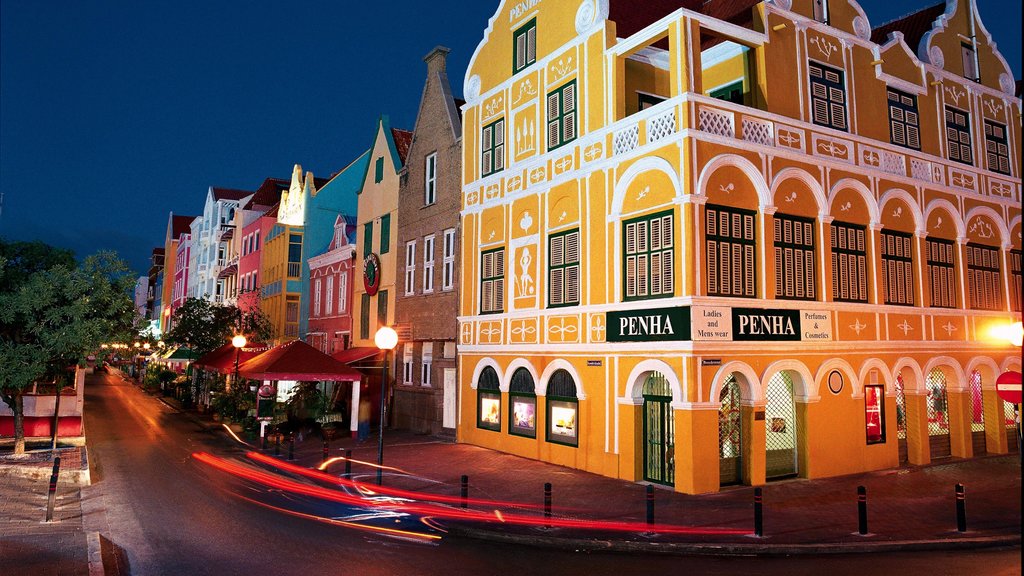 Willemstad showing night scenes, a city and street scenes