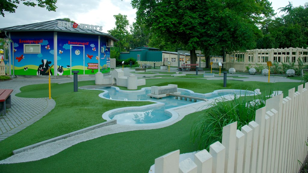 Folkets Park featuring a playground and a garden