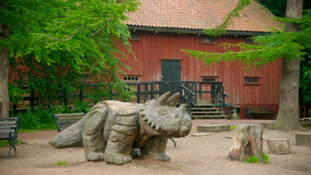 Botanic Gardens which includes a statue or sculpture and a park