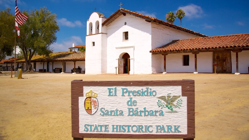 El Presidio de Santa Barbara State Historic Park featuring signage and heritage elements