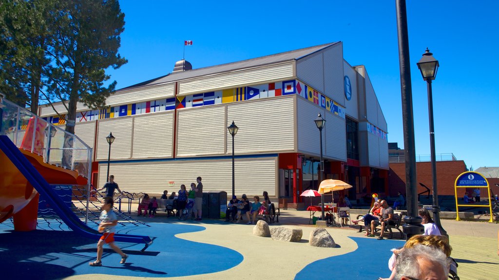 Maritime Museum of the Atlantic showing a playground as well as a large group of people