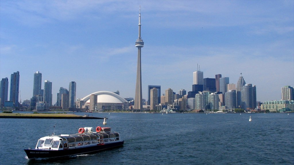 CN Tower which includes general coastal views, a ferry and a city