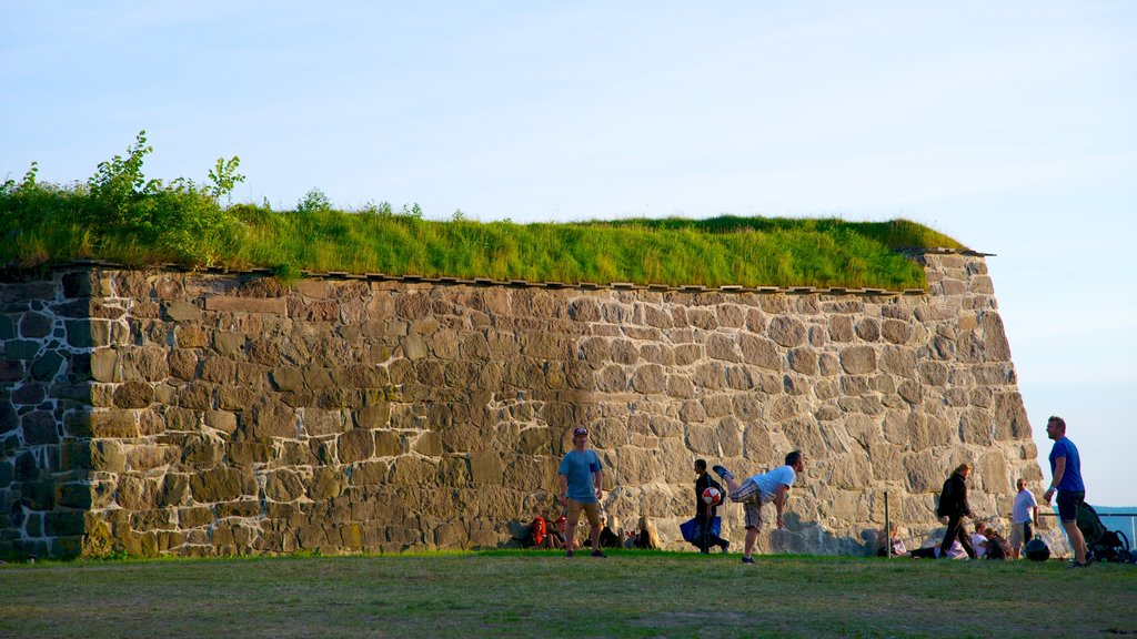 Akershus Fortress as well as a small group of people