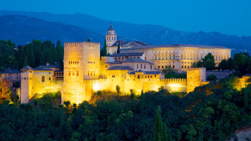 Mirador de San Nicolas which includes night scenes, heritage architecture and chateau or palace