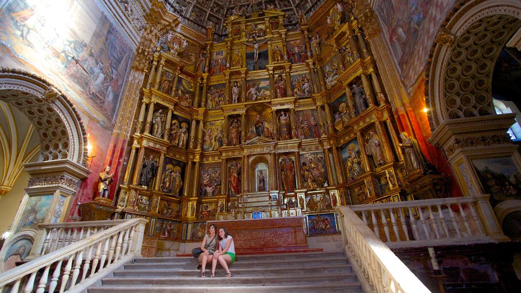 Mosteiro de São Jerônimo que inclui vistas internas, arte e elementos religiosos