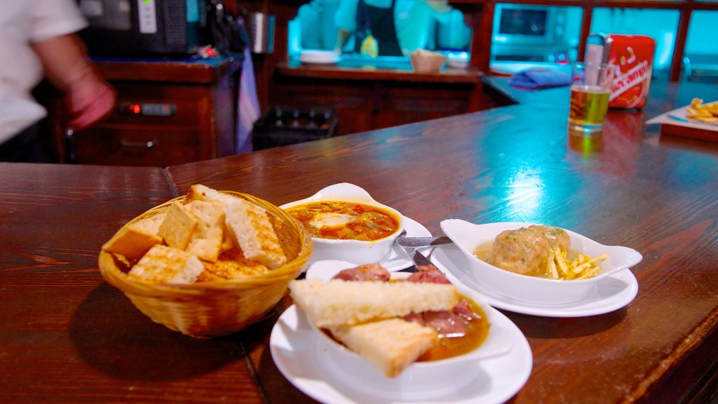 Seville featuring food and a bar