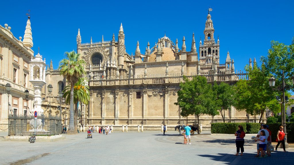 Seville Cathedral showing a square or plaza, a church or cathedral and heritage architecture