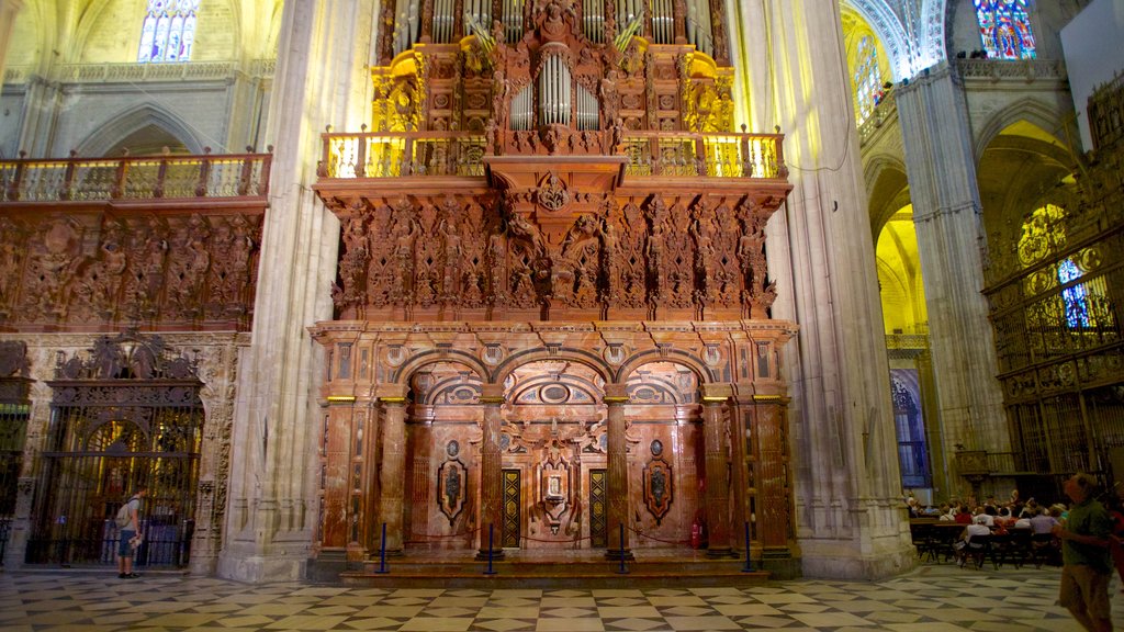 Seville Cathedral featuring religious aspects, interior views and a church or cathedral