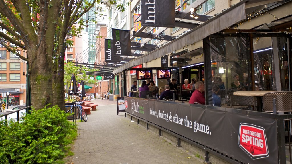 Yaletown showing a city, street scenes and a bar