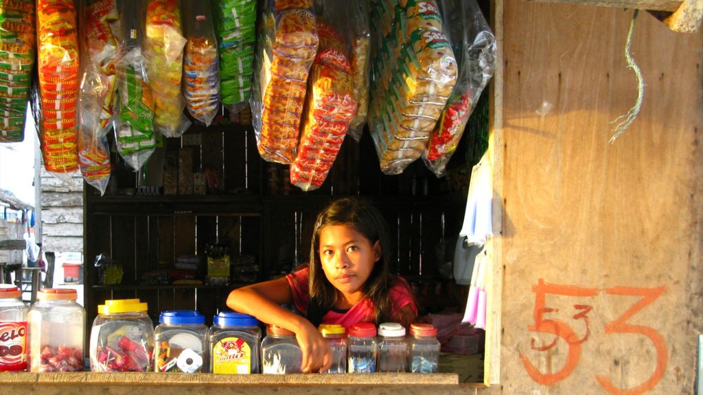 Malasia que incluye mercados y también una mujer