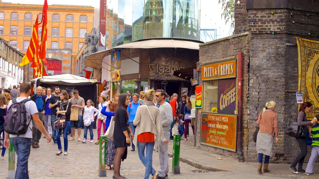 Camden Town showing a city and a square or plaza as well as a large group of people