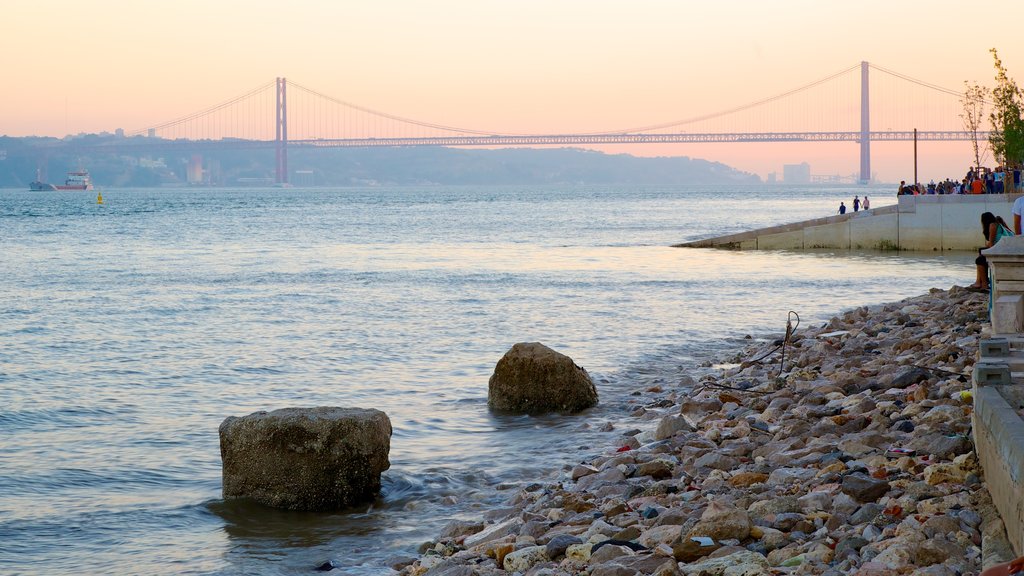 Commerce Square showing a pebble beach, general coastal views and a bridge