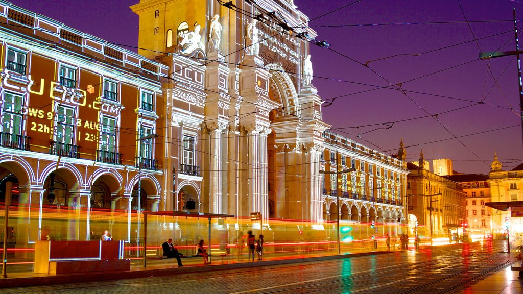 Commerce Square which includes street scenes, a city and night scenes