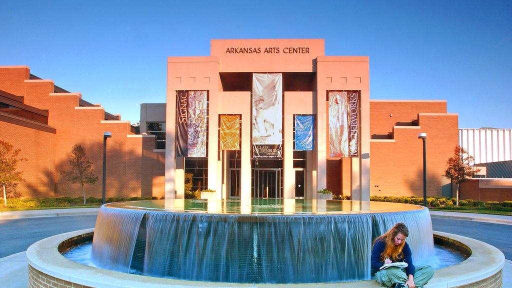 Little Rock which includes modern architecture and a fountain as well as an individual female