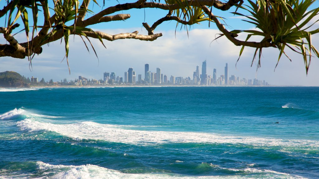 Burleigh Heads showing a skyscraper, general coastal views and surf