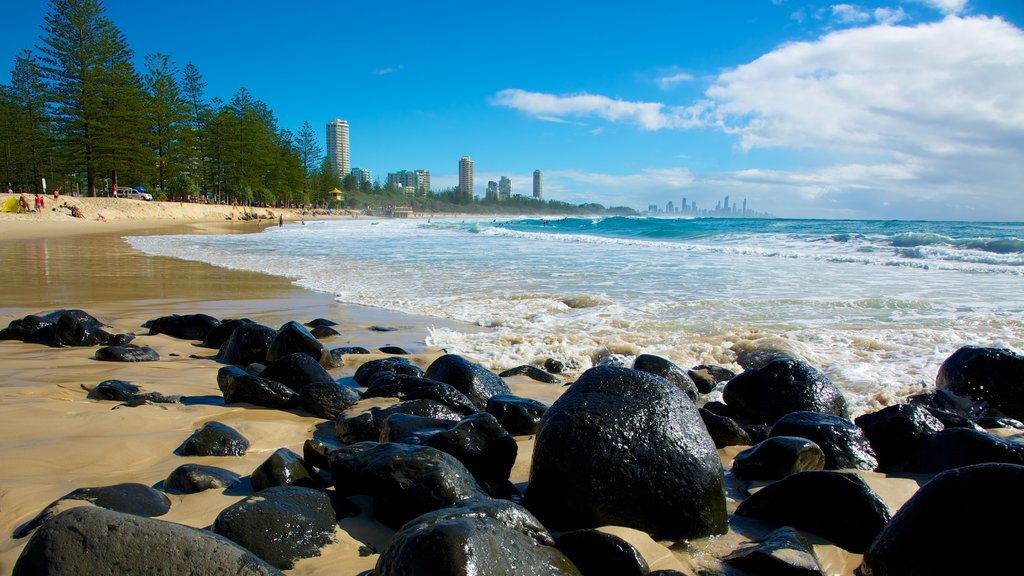 Burleigh Heads which includes a beach, rocky coastline and general coastal views