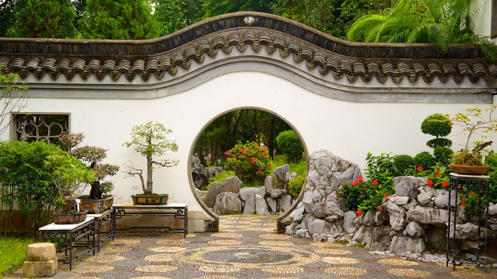 Kowloon Walled City Park som visar en trädgård