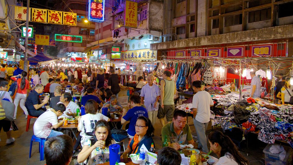 Kowloon que incluye imágenes de calles, escenas de noche y comidas al aire libre