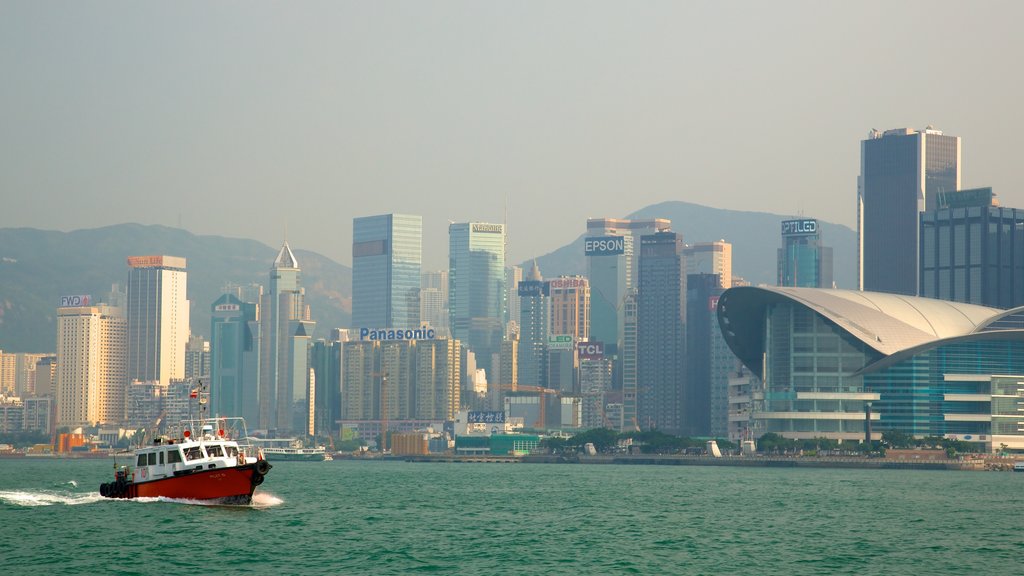 Victoria Harbour showing skyline, a city and boating