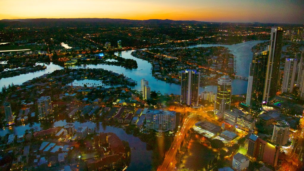 SkyPoint Observation Deck which includes modern architecture, night scenes and a high-rise building