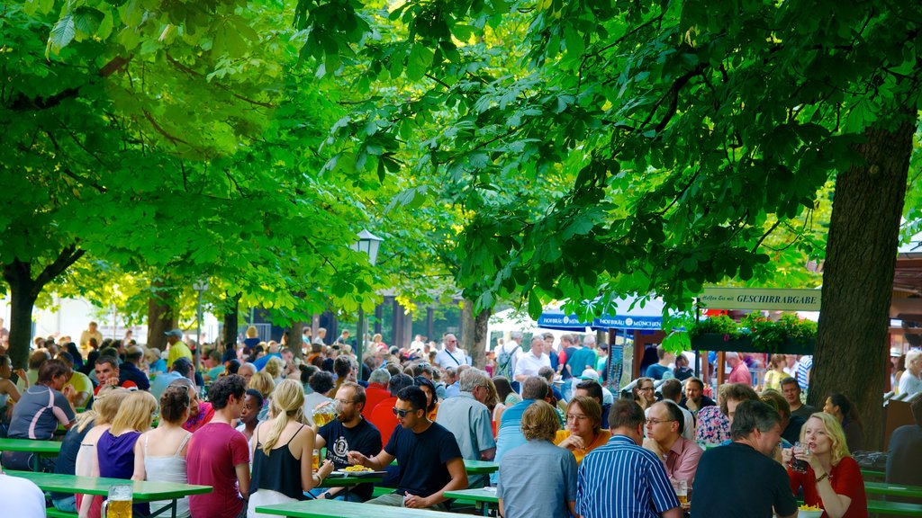 English Garden which includes a square or plaza, outdoor eating and a garden