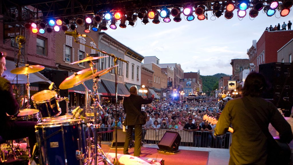 Deadwood which includes a square or plaza, music and a small town or village