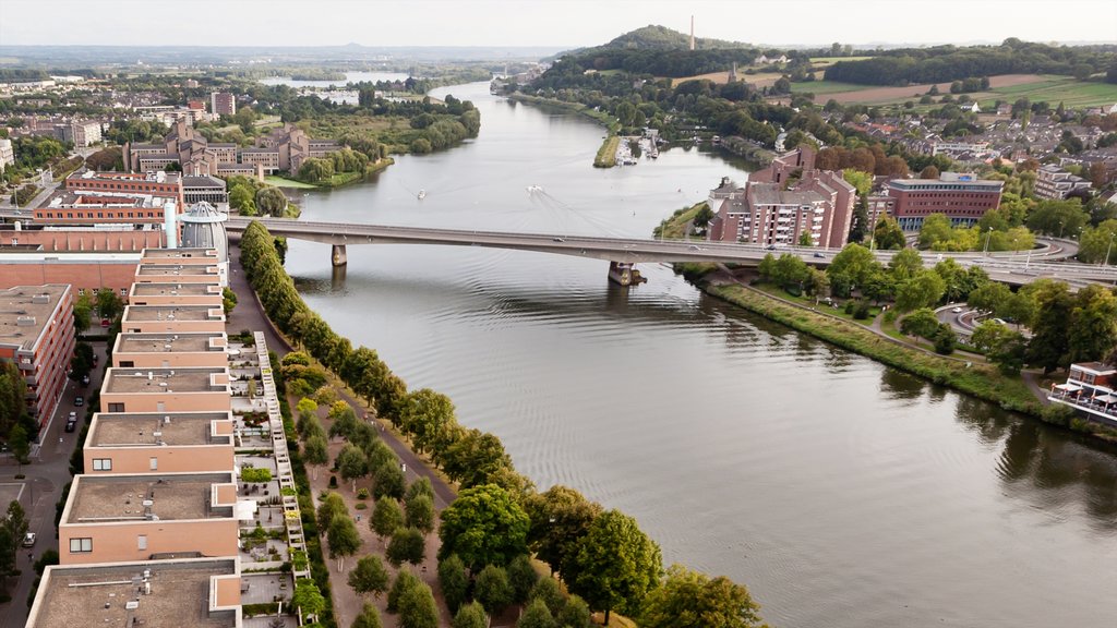 Maastricht featuring a city, a river or creek and a bridge