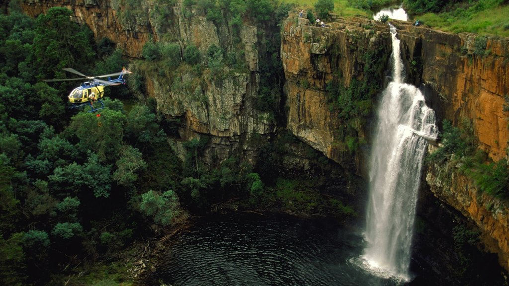 Graskop showing a cascade and an aircraft