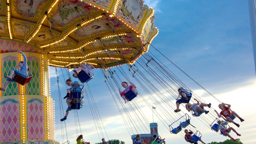 Tivoli Grona Lund showing rides as well as children