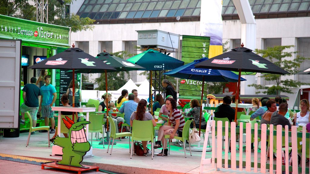 Centro de Montreal mostrando una ciudad, escenas urbanas y refrescos o bebidas