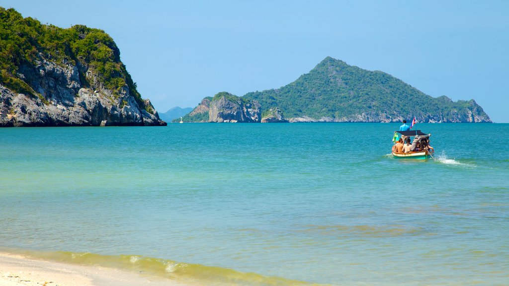 Sam Roi Yot National Park showing a sandy beach, boating and mountains