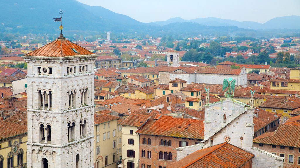 Torre delle Ore showing heritage architecture and a city