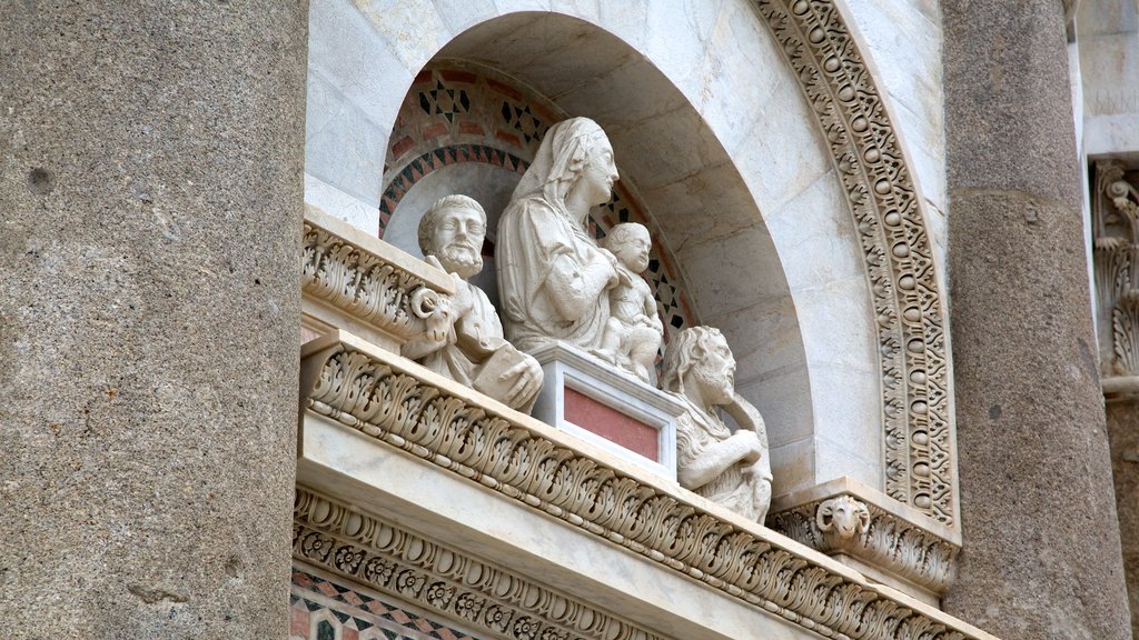 Leaning Tower featuring heritage architecture, outdoor art and a statue or sculpture