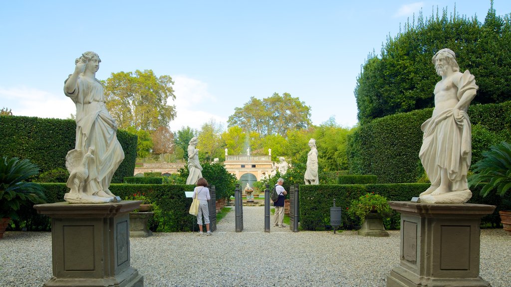 Palazzo Pfanner featuring a park, art and a statue or sculpture