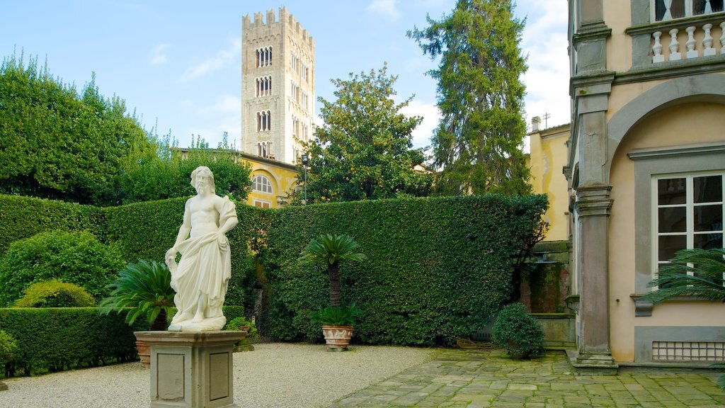 Palazzo Pfanner featuring heritage architecture, outdoor art and a statue or sculpture