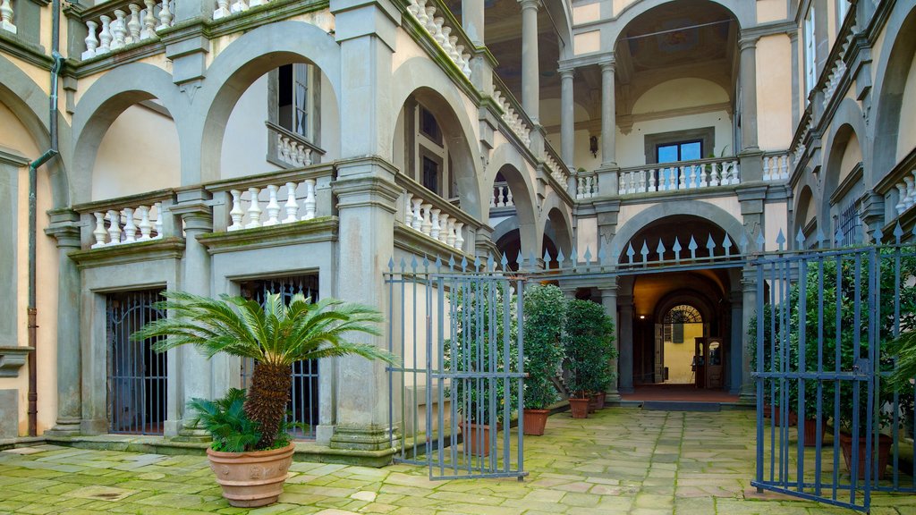 Palazzo Pfanner que incluye arquitectura patrimonial y castillo o palacio