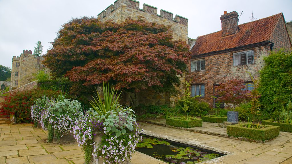 Penshurst Place and Gardens which includes flowers, a house and heritage architecture