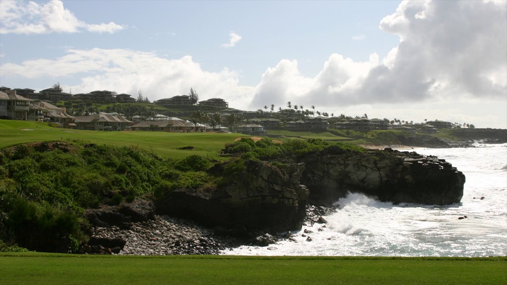 Kapalua Beach featuring golf and rocky coastline