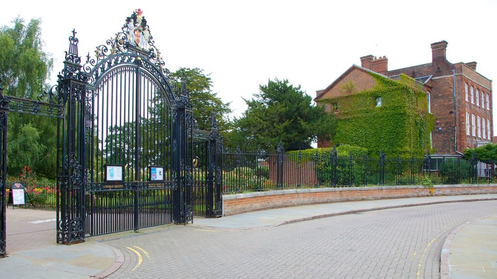 Colchester Castle Park featuring heritage architecture and a garden