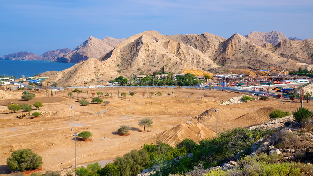 Shatti Al Qurum which includes tranquil scenes and mountains