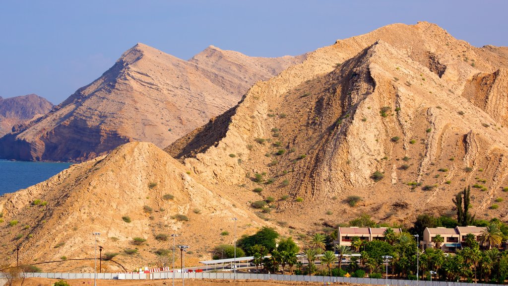 Shatti Al Qurum featuring mountains