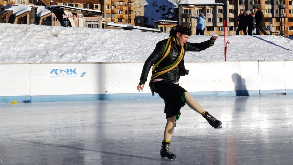 Morzine showing performance art, snow and ice skating