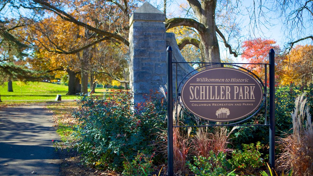 Schiller Park featuring signage and a park